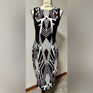Beautiful dress for office or a night out. Size small